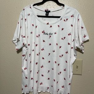 White shirt with small red roses.